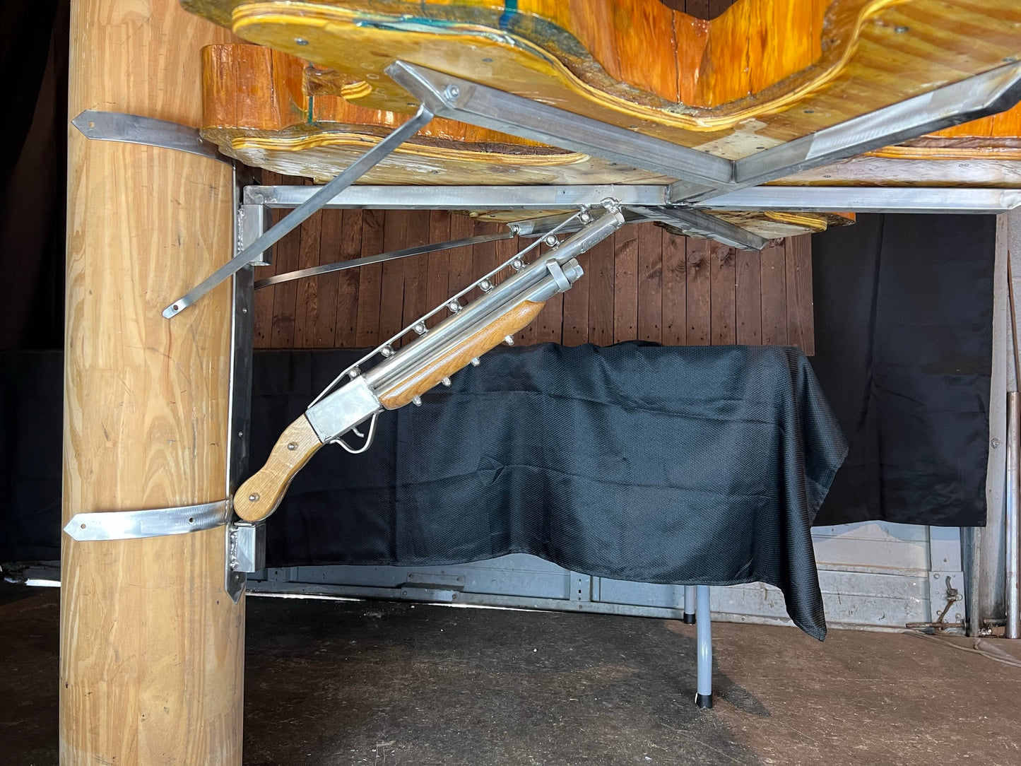 "One-of-a-kind" live edge table with a custom mount.